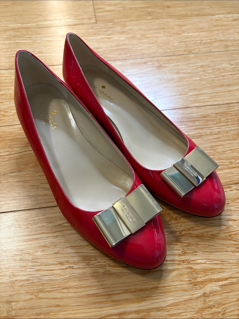 Kate Spade New York Roxana Red Patent Leather Bow Wedge Pumps size 8B designer